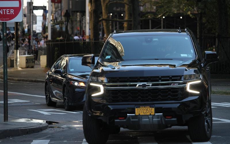 Black Chevrolet Suburban executive vehicle